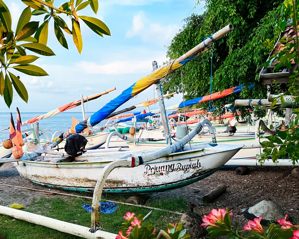 A fishing boat in Lipah Beach, Bali, called "Pejuang Rupiah" which means providing the rupiah.