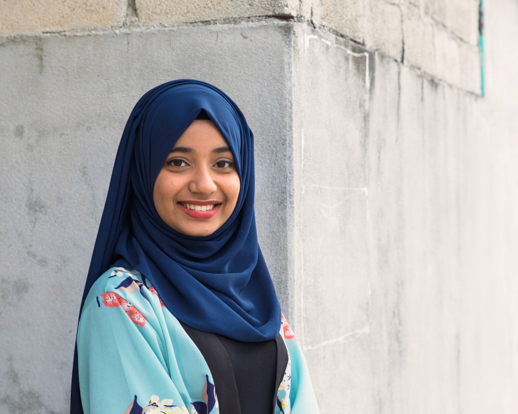 Maldivian young woman on the island of Thulusdoo
