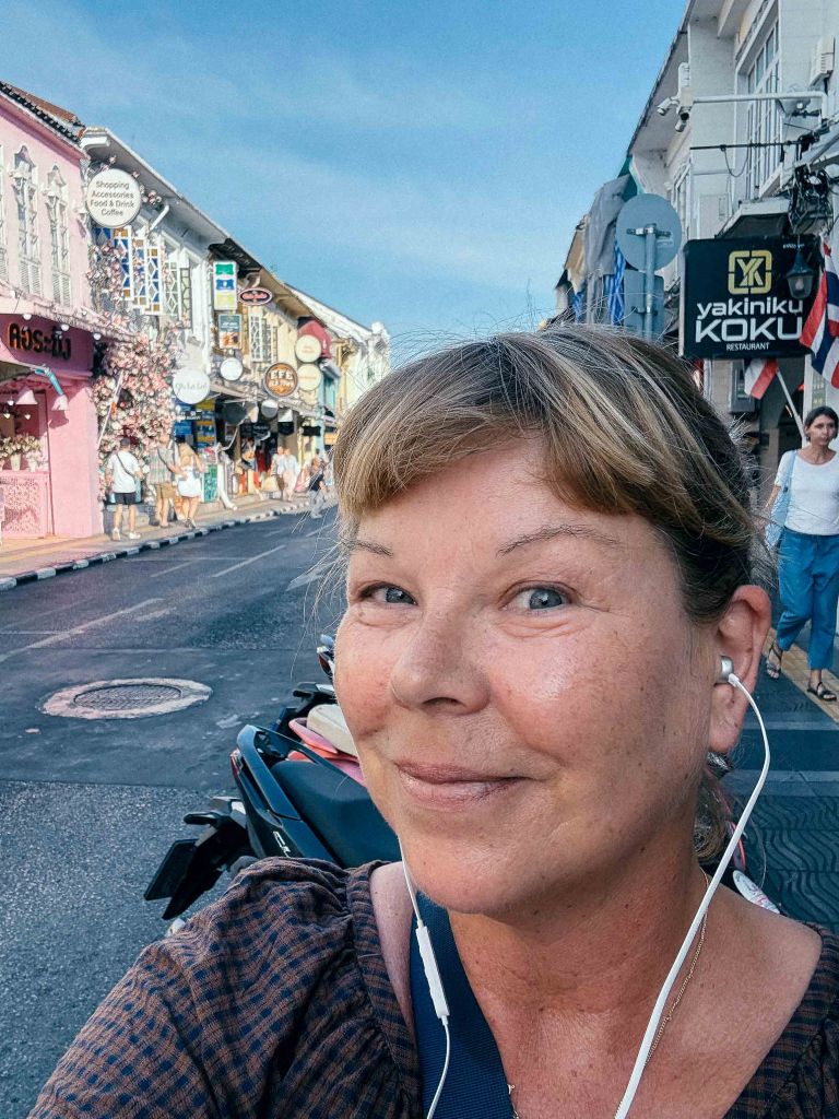 Helena Mettävainio of HelenaAndTheSea.com walking around in Old Town Phuket, January 2026