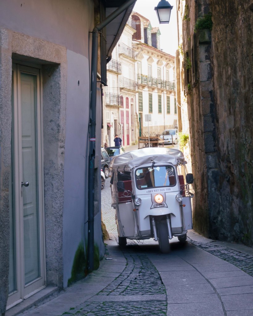 Rikshaw in the narrow alleys of Porto, Portugal