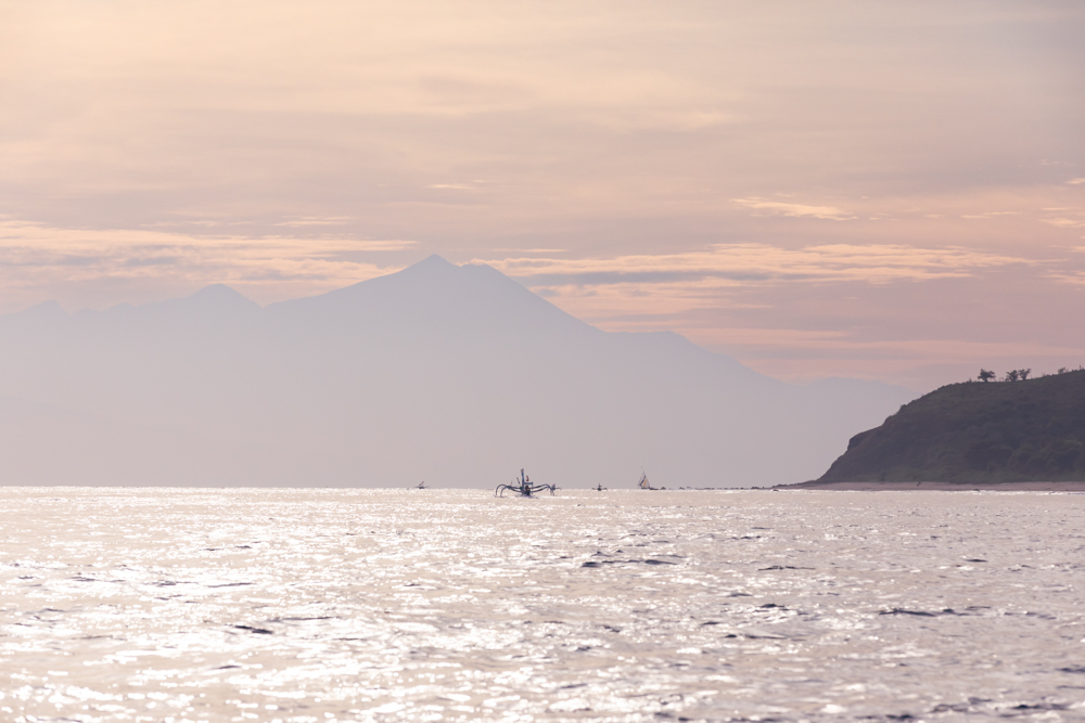 Sunrise at sea, Mount Agung in the bakground, Lombok, Inonesa