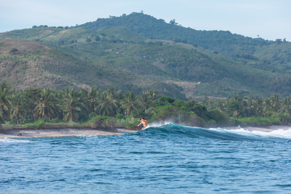 Surfer at Desert Point, Lombok, Indonesia 2022