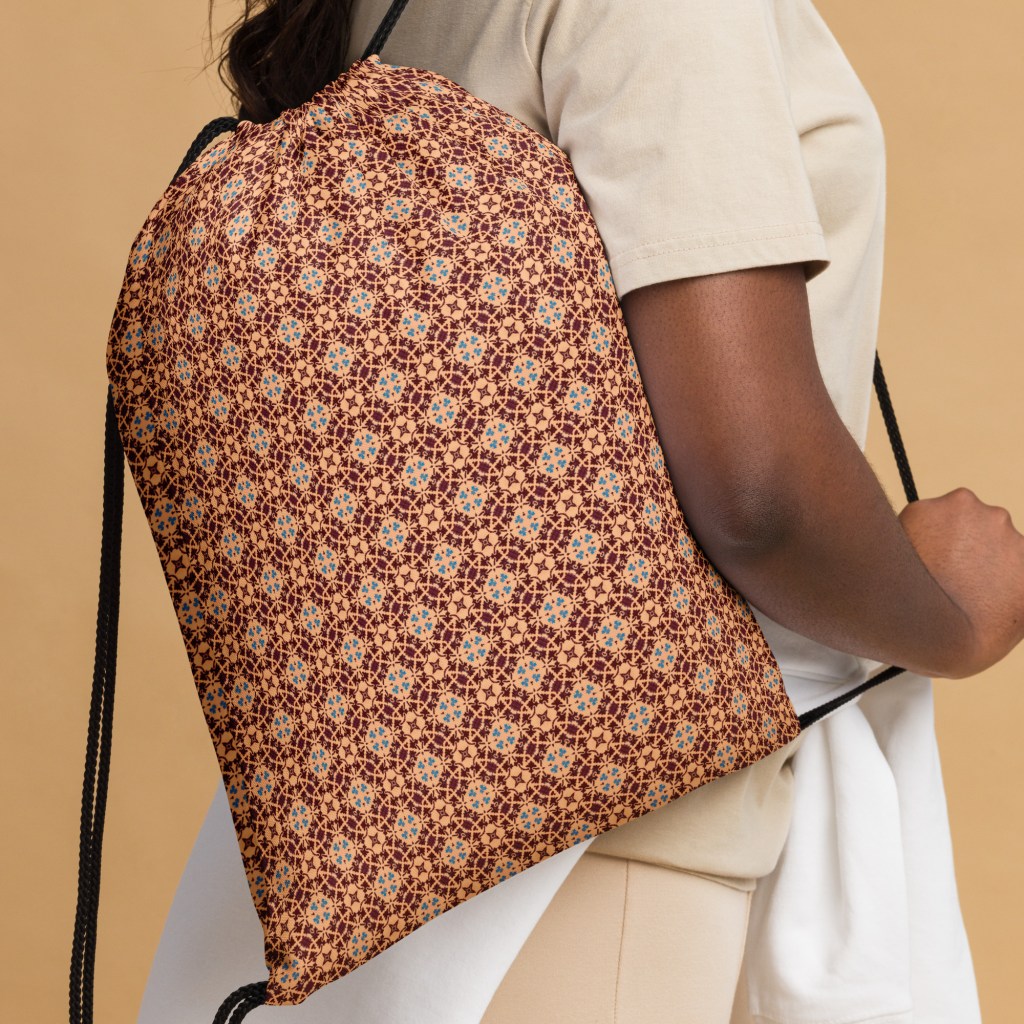 Drawstring backpack with the Porto rust and blue mosaic print made by HelenaTheSea.com 